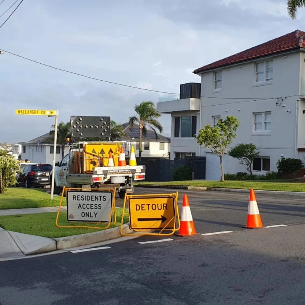 Residents access only and detour signs at a road closure